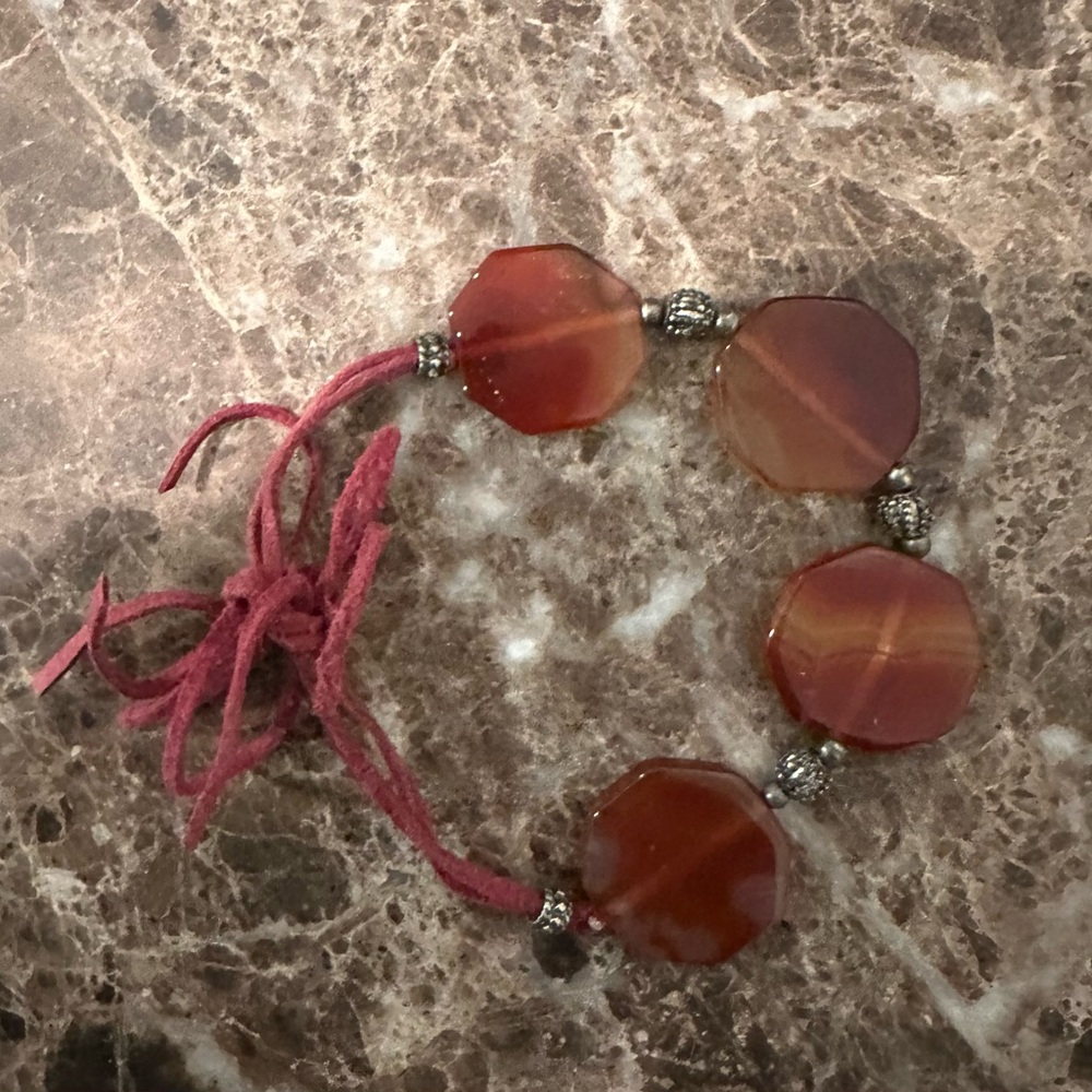 Red Orange Colored Stone Bracelet With Silver Accents and Leather Ties